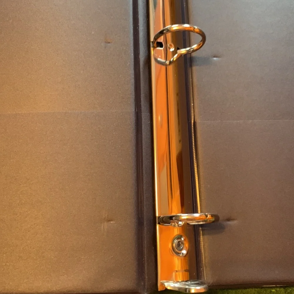 2 Penn state binders. Rough measurements in photos.